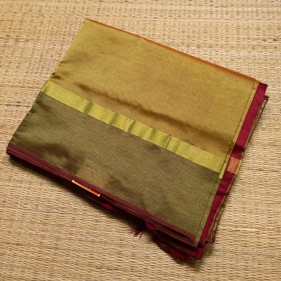 Gold shade handwoven silk cotton Saree with burgundy pallu and blouse piece