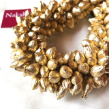 Gold mallipoo hair accessory